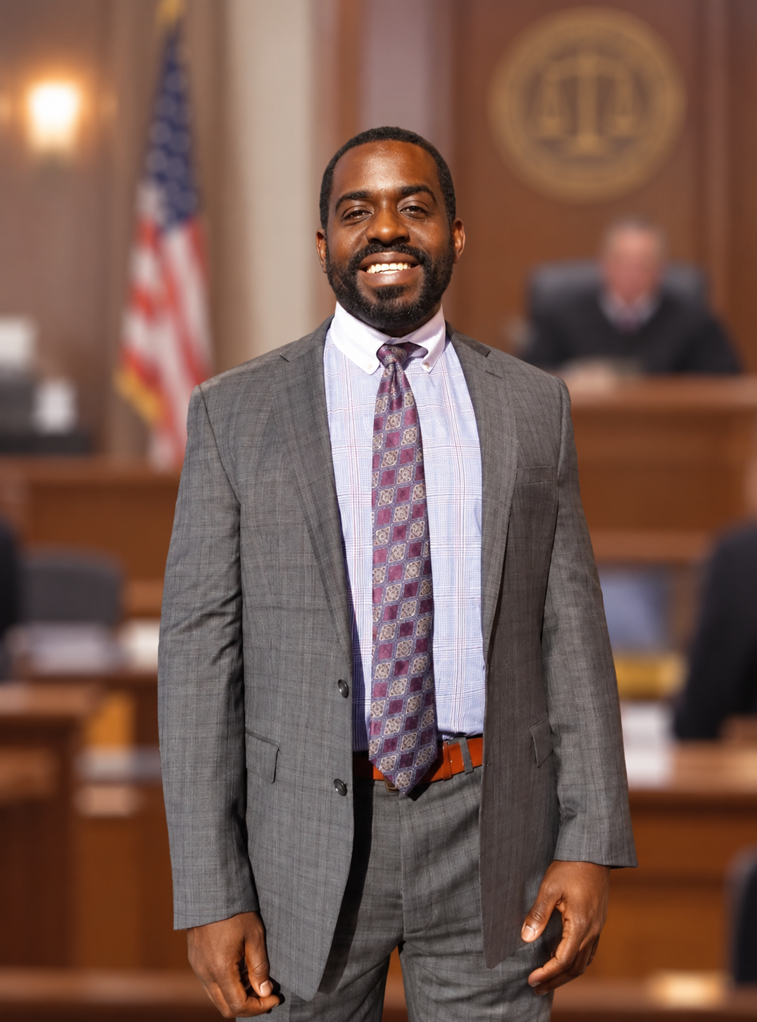Attorney Tripoli Freeman standing in a courtroom